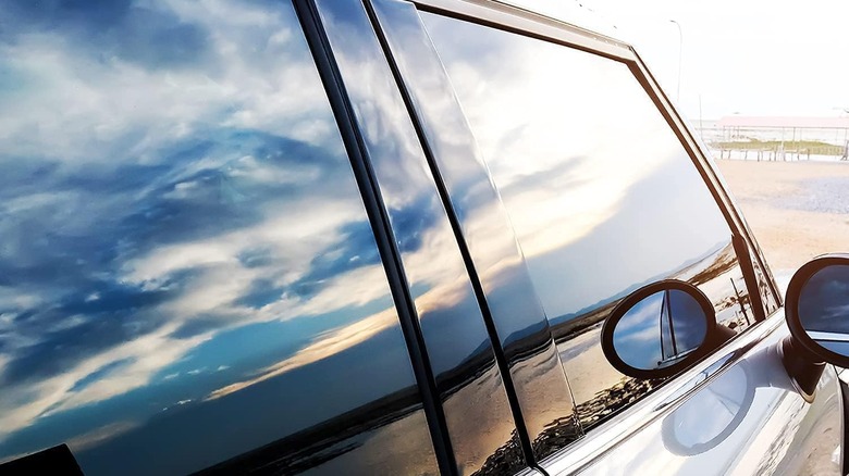 A car with window tint that does not let you see inside.