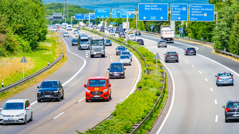 Autobahn with average traffic during midday, overhead view looking down the road