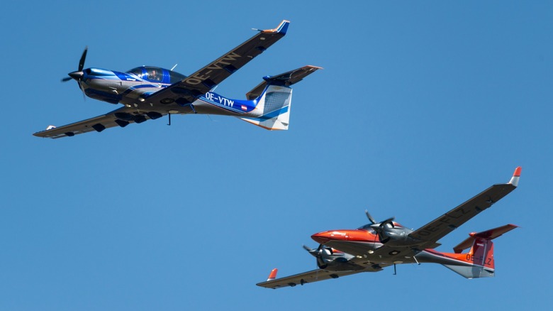 a Diamond DA50 RG and DA42 flying in formation