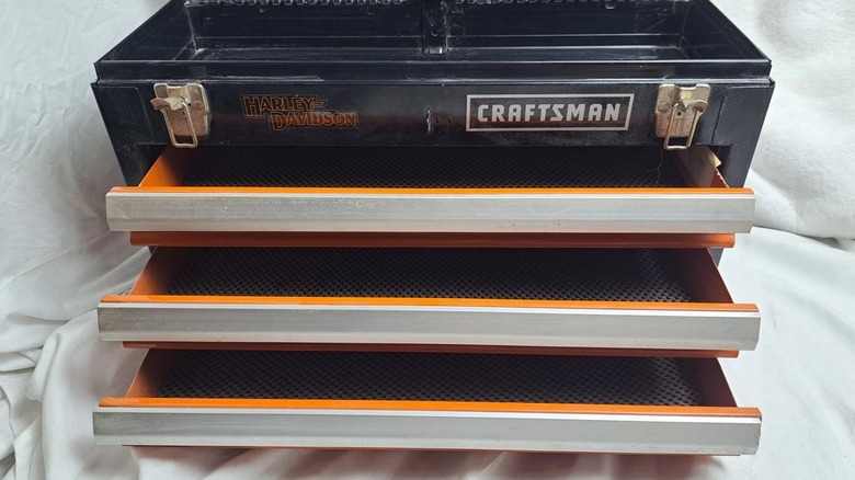 A Harley-themed three-drawer Craftsman toolbox with the drawers opened.