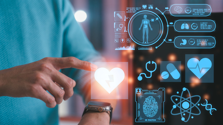 A person wearing a smartwatch with health monitoring imagery overlaid on top.