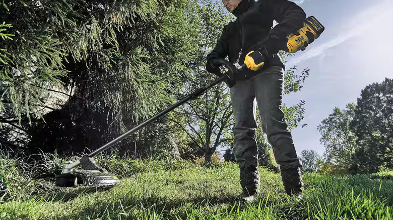 DeWalt string trimmer in use