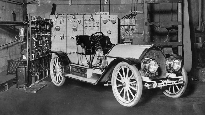 A 1900s electric vehicle charging at a mercury arc charger