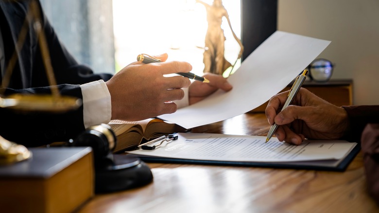 lawyers reviewing documents