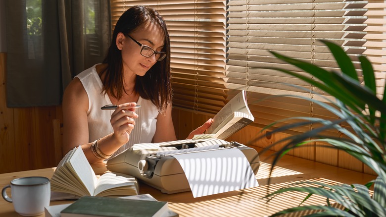 author using a typewriter