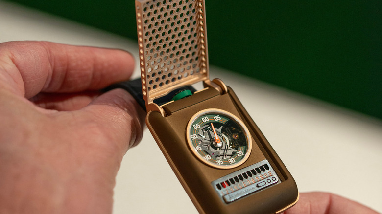 Hautlence Retrovision 64 watch with the lid open