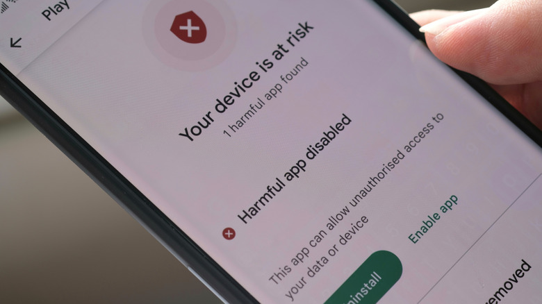 Your device is at risk warning message by Google Play Protect.