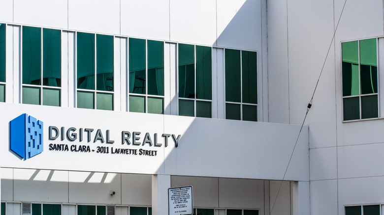 Digital Realtybranded white building with dark windows
