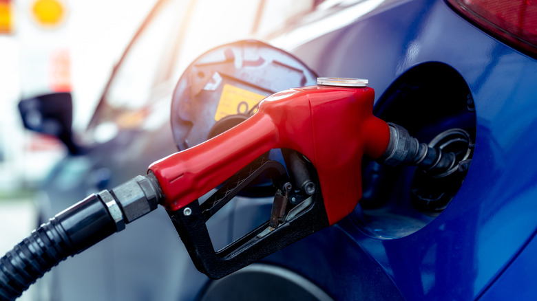 Close up of pump in car's gas tank