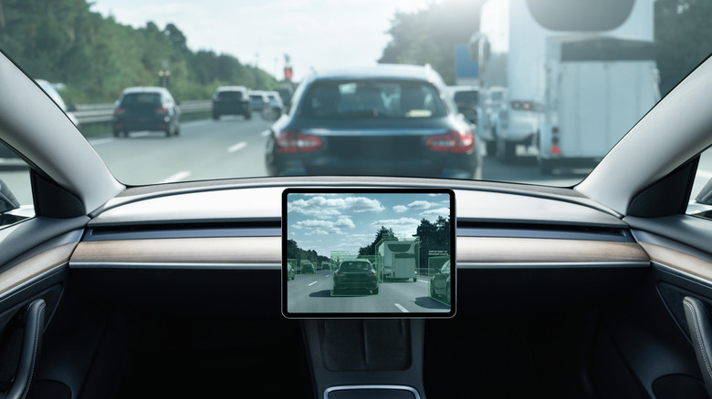 View from the back seat of a self-driving car on the road