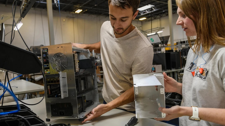 Engineers at work at a system76 assembly facility