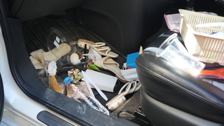dirty and cluttered car interior