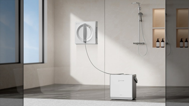 The ECOVACS WINBOT W2 PRO OMNI cleaning a bathroom surface.