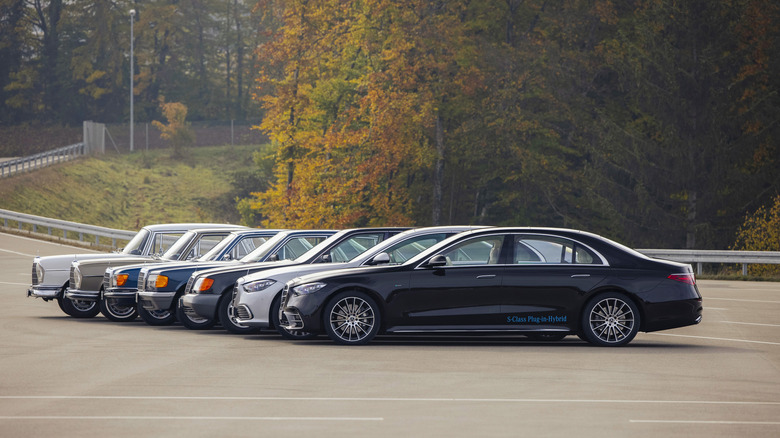 lineup of historical Mercedes-Benz S-Class cars