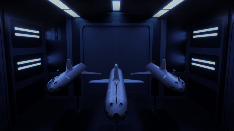Three AI-powered Helsing SG-1 Fathoms sit docked and ready.