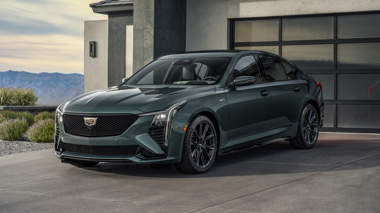 2025 Cadillac CT5-V on driveway, dark green exterior