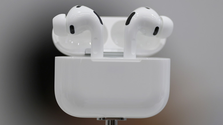 A set of AirPods Pro in their charging case.