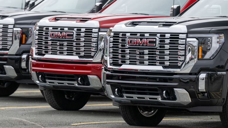GMC trucks in a line