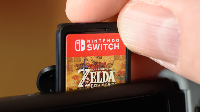 Inserting game card into Nintendo Switch