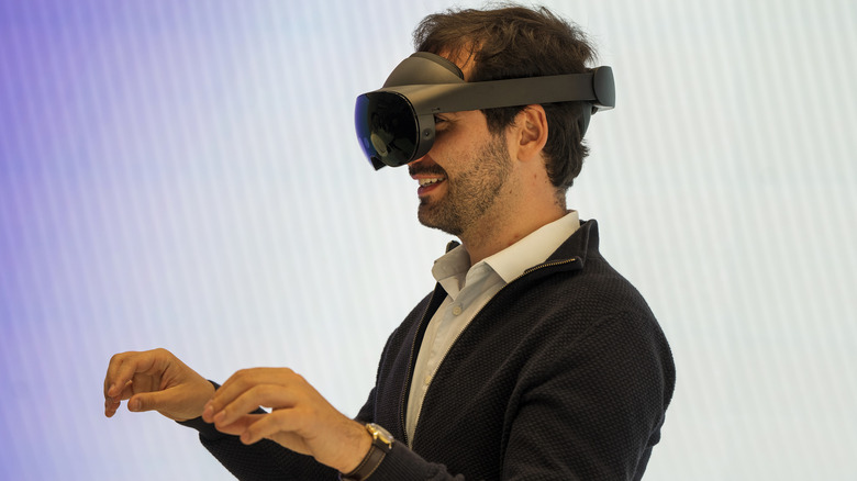 A person wearing the Meta Quest Pro VR headset 