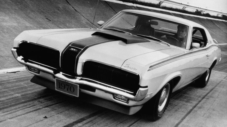 Front 3/4 view of 1970 Mercury Cougar in trackside setting