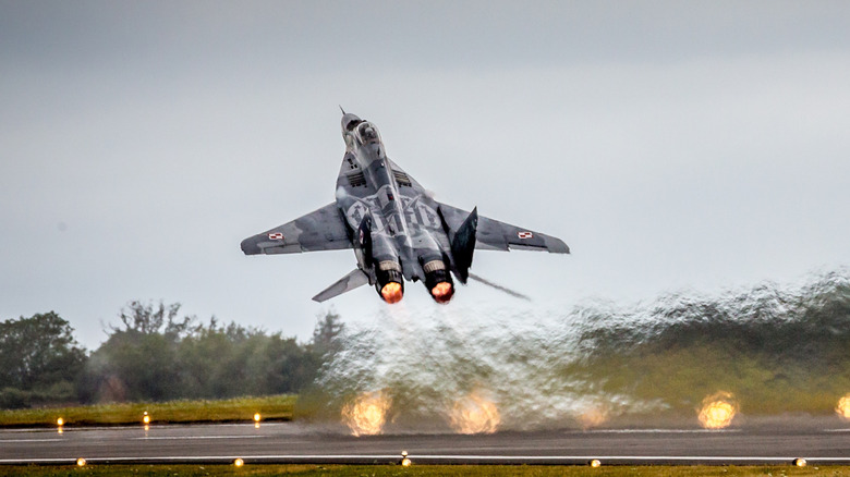 MiG-29 performing a full power takeoff, its upper air intakes visible