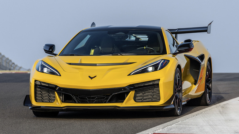 Yellow Corvette ZR1 parked curbside on track
