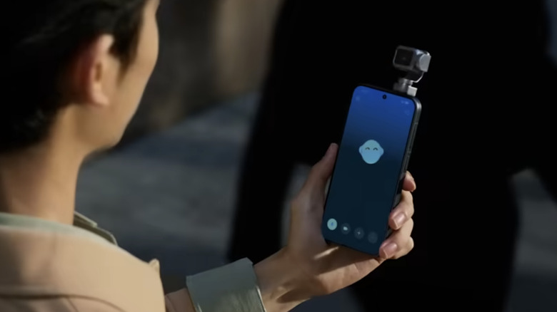 a man talks to his honor robot phone's ai