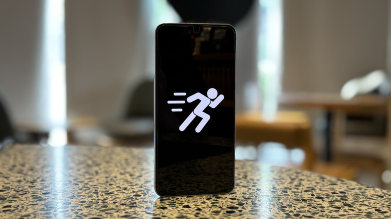 an android phone displays a running vector
