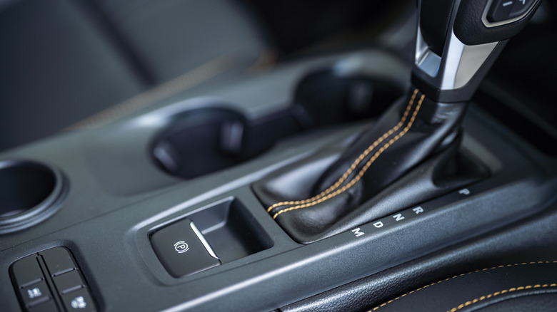 Close-up of parking brake engaged in vehicle