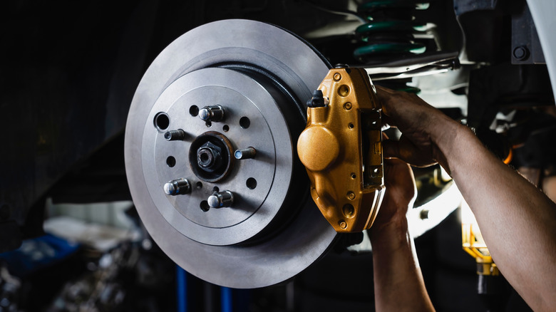 Car's rear brakes with brake rotor visible