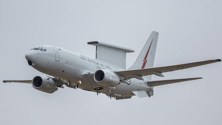 The E-7 Wedgetail soars through the sky.