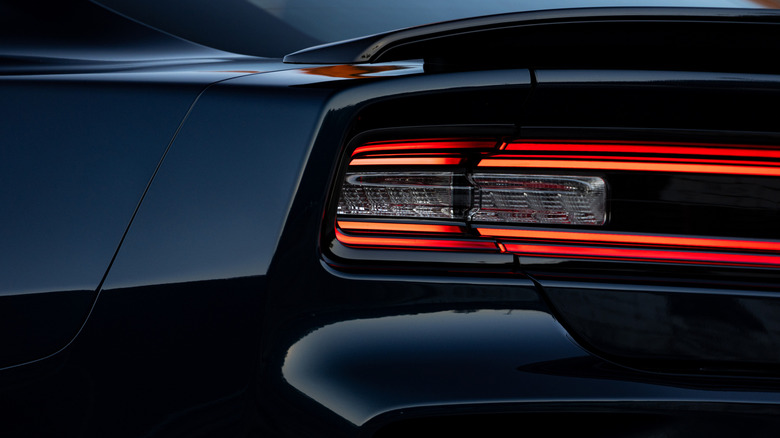 Rear light of a black 2026 Dodge Charger.