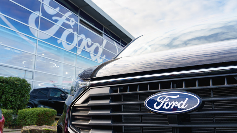 A Ford parked outside a dealership