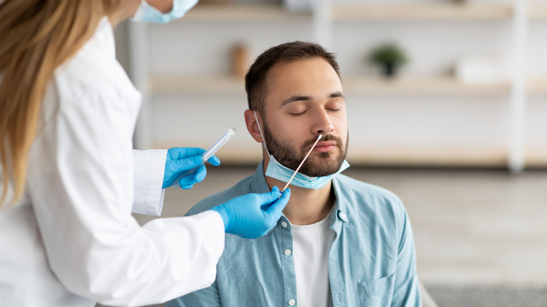 Man undergoing Covid test.