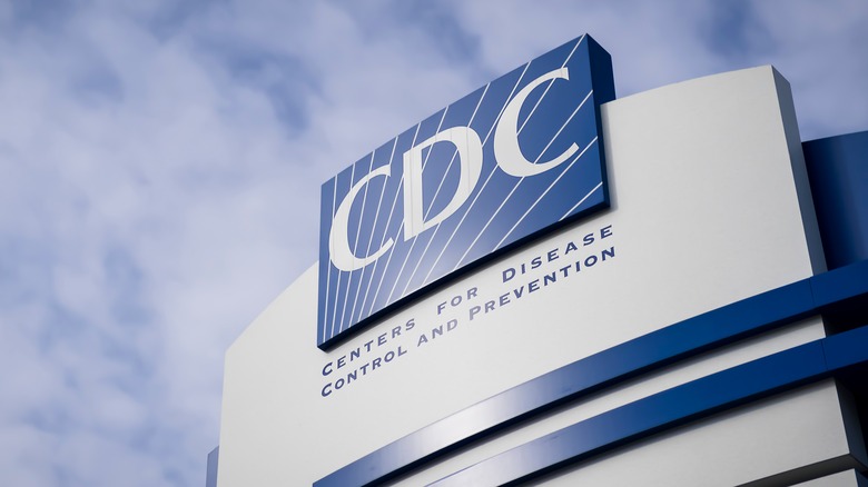 The CDC logo on top of a building.