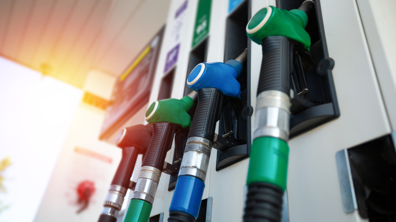 Close up of the nozzles at a gas station.