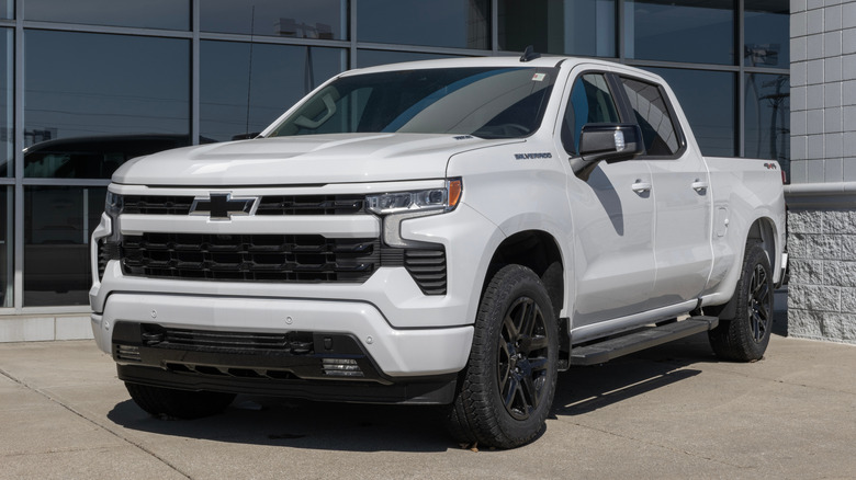White 2025 Chevy Silverado 1500 outside dealership