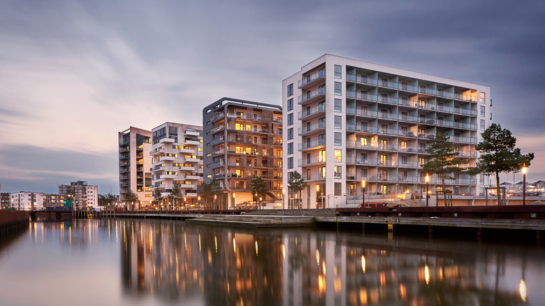 Street lights near a waterfront apartment building in Odense, Denmark