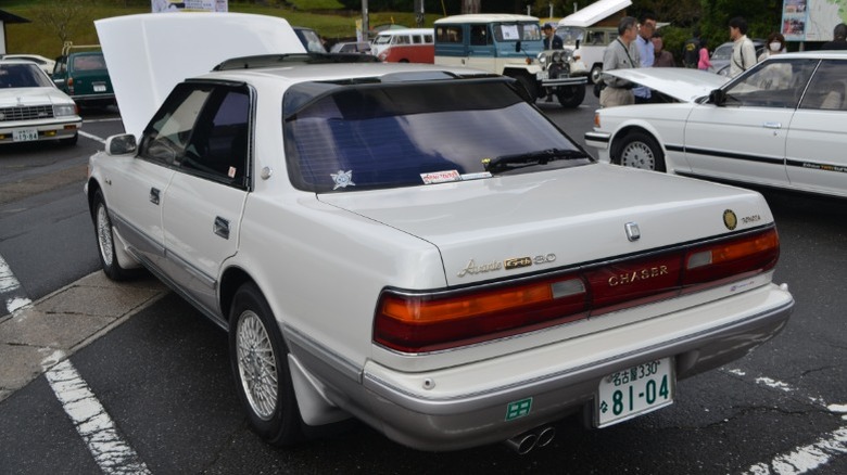 Rear view of white 1992 Toyota Chaser 2.5 GT Turbo Avante G with hood open