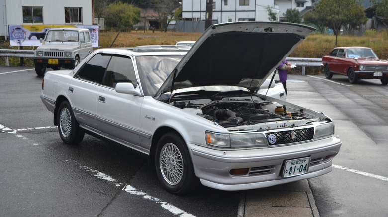 Front-right view of white 1992 Toyota Chaser 2.5 GT Turbo Avante G with hood open