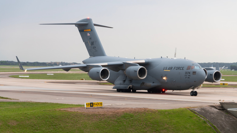 A C-17 Globemaster III on the runway.