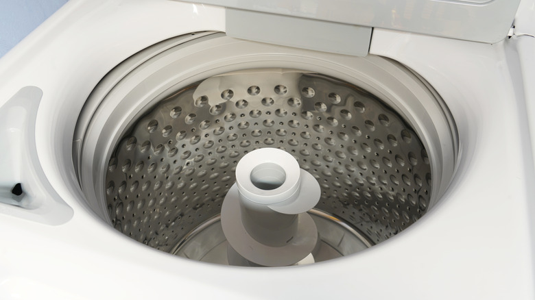 Close up of inside of top loading washing machine.