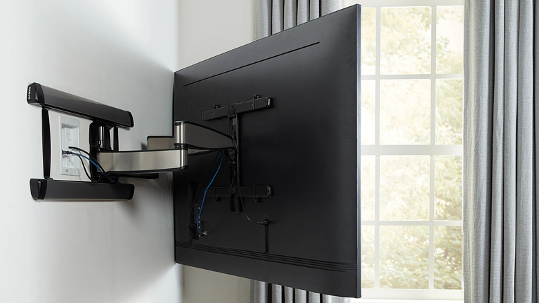 Sanus cable management kit hidden behind a TV screen