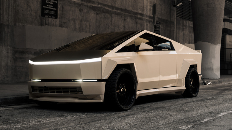 White Tesla Cybertruck parked in an urban environment