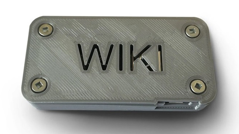 Compact metal Internet-in-a-box server with "Wiki" cut into case as decoration and cooling