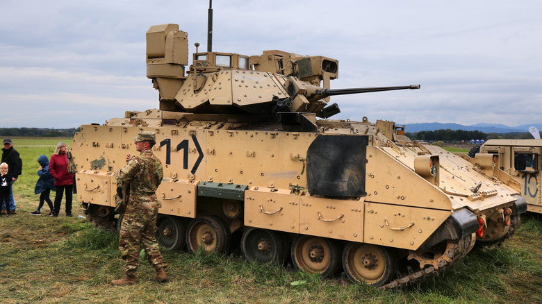 Bradley Fighting Vehicle on display in a field