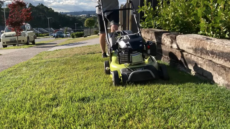 Mowing lawn with Ryobi mower powered by Subaru engine