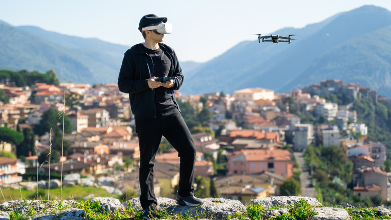 Person flying an FPV drone