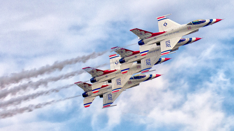 Four U.S. Air Force Thunderbirds performing at air show